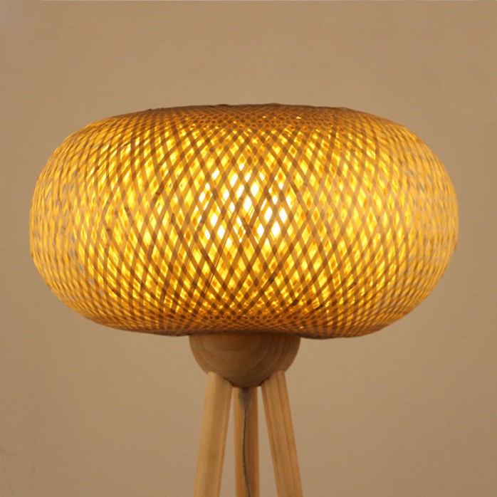 Triangular floor lamp with hand-woven bamboo shade