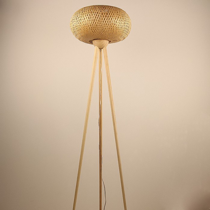 Triangular floor lamp with hand-woven bamboo shade